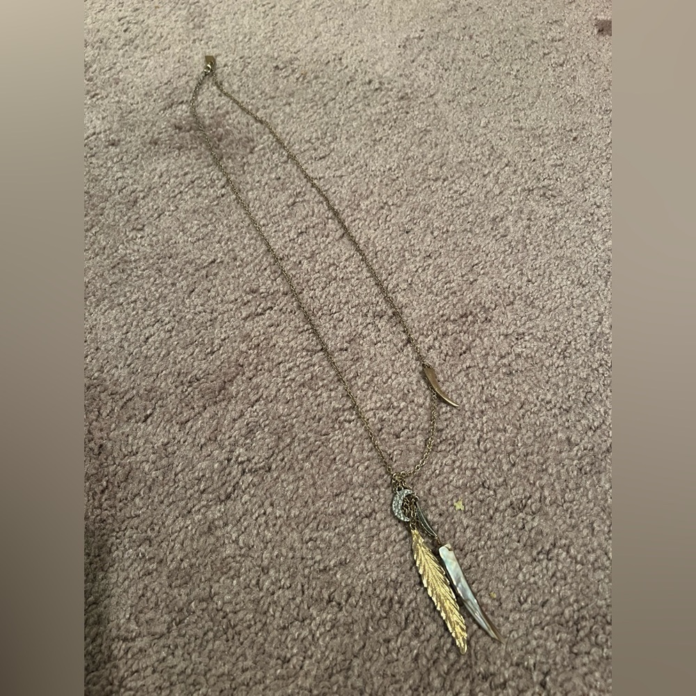 Gold feather long necklace